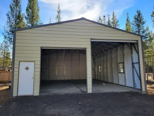 Double RV storage carport with enclosed bay